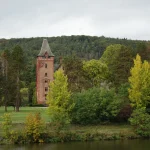 Old castle in a park at a river, Mettlach, Saarland, Germany